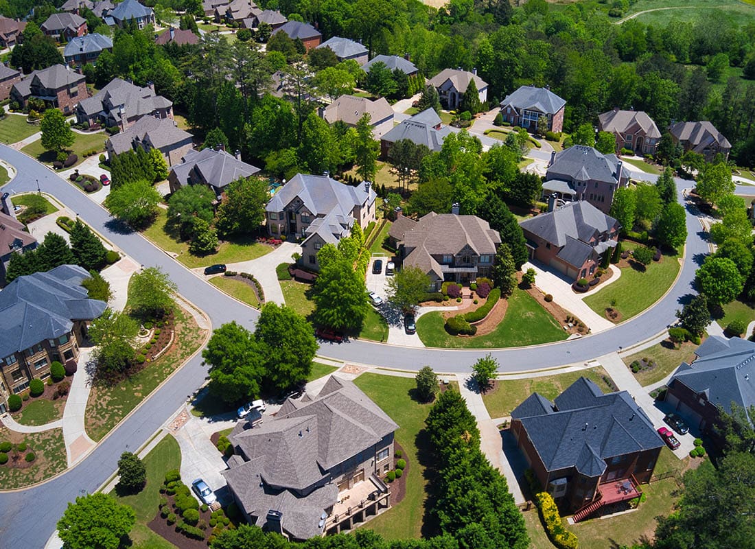 Spencer, WV - Aerial View of Residential Homes in Cumming, GA on a Sunny Day
